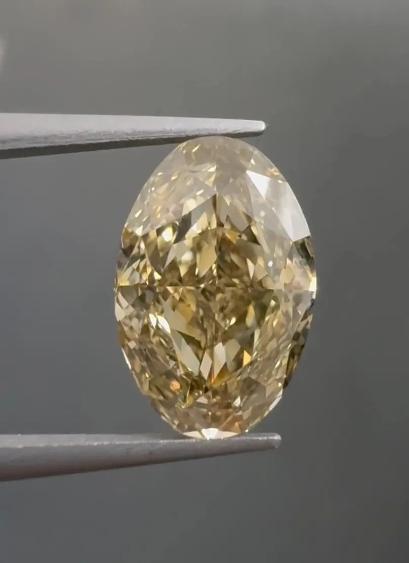 2.51ct Oval Natural Diamond (Colour Fancy Yellow Brown, Clarity VS1, GIA Certified)