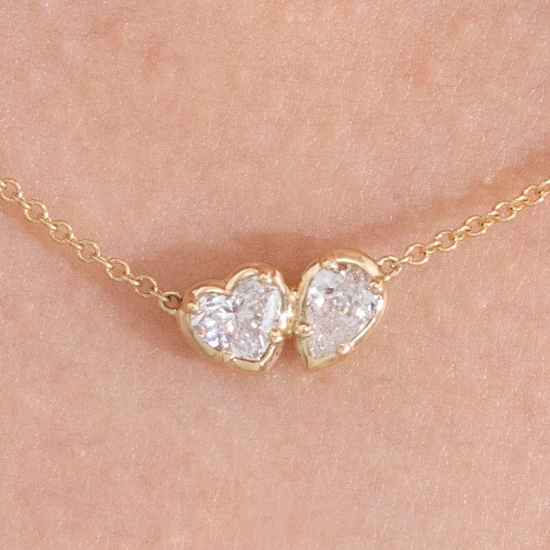 Toi Et Moi Heart & Pear Shape Diamond Bezel Pendant Yellow Gold Necklace in 14k yellow gold - Angled View