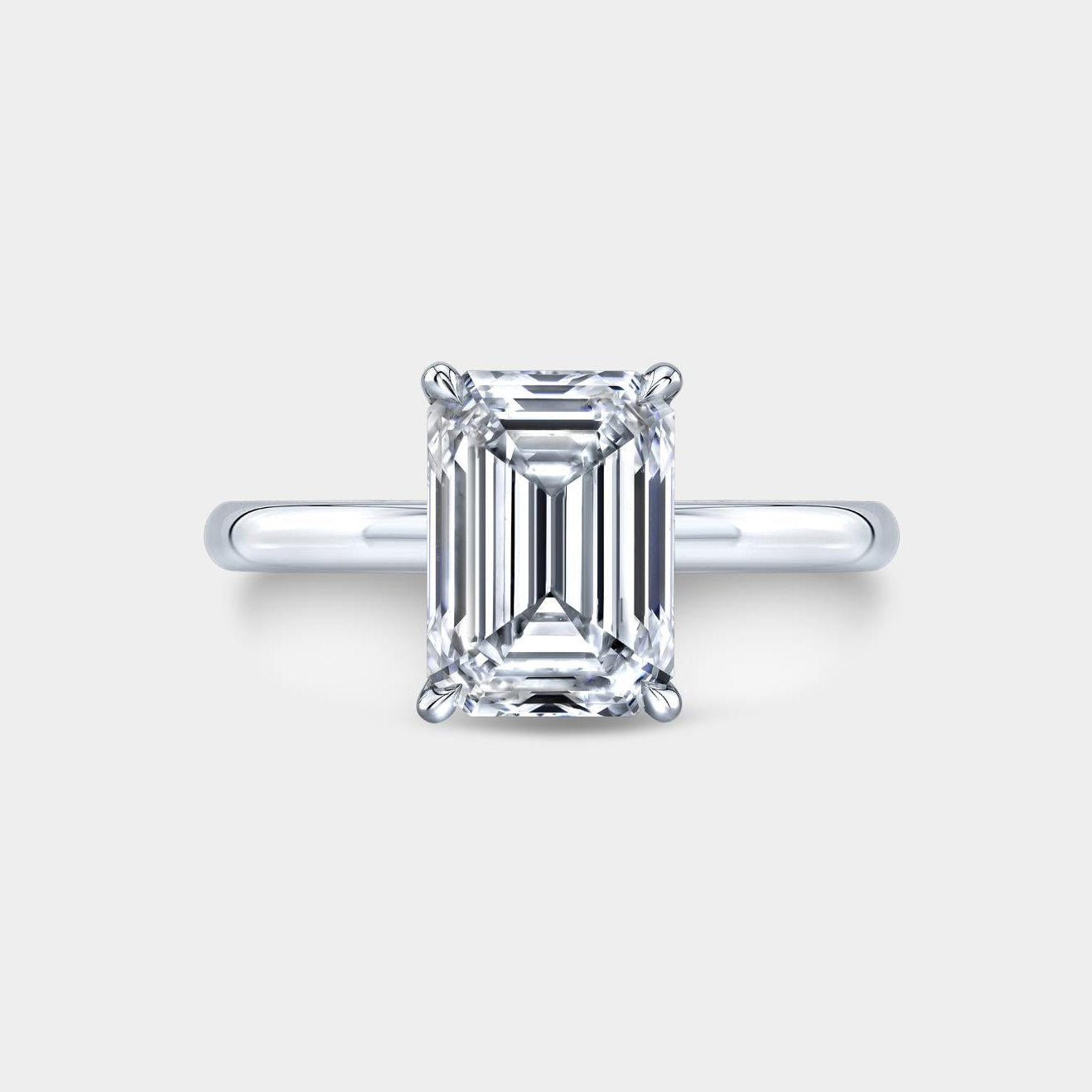 Emerald Diamond Hidden Halo Solitaire Platinum Engagement Ring