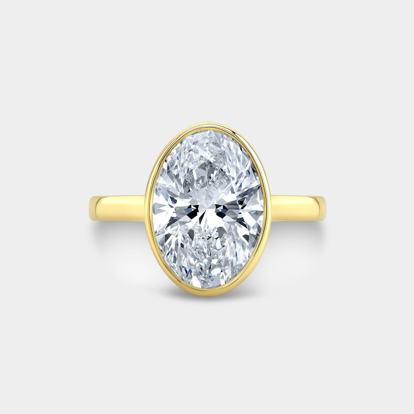 3.11ct Lab Grown Oval Diamond Bezel Set Tulip Solitaire Yellow and Platinum Gold Engagement Ring