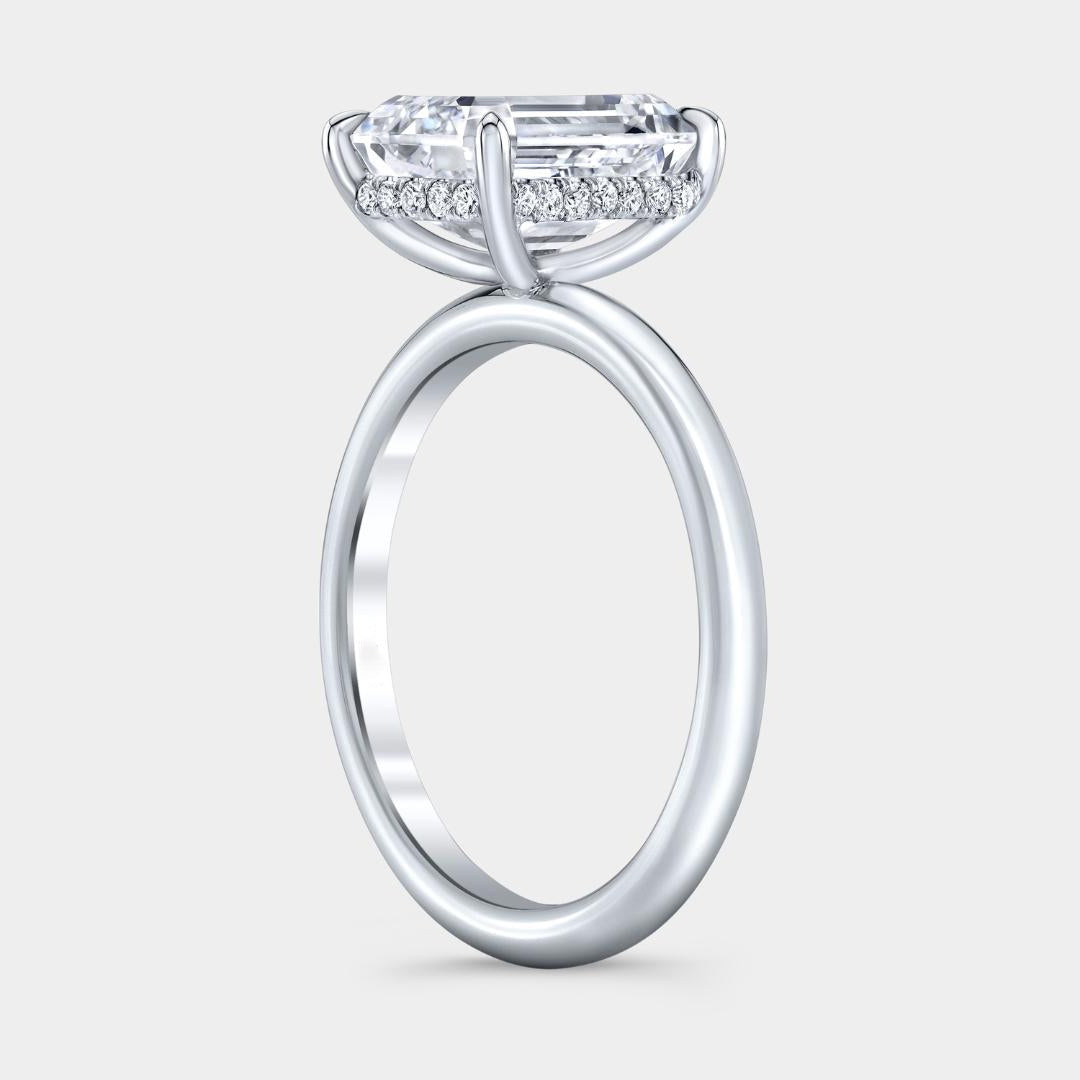 Emerald Diamond Hidden Halo Solitaire Platinum Engagement Ring