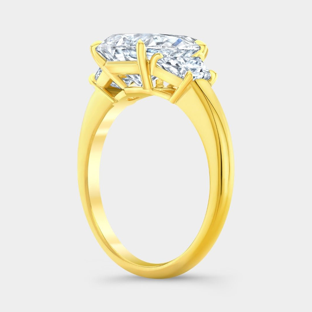 4ct Pear Shape Diamond with Trapezoid Yellow Gold 3 Stone Ring in 18k yellow gold
