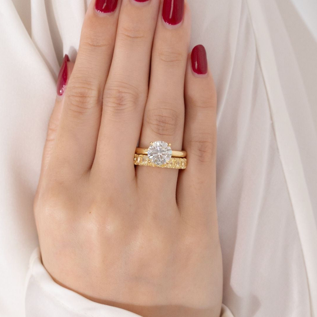 5.5ct Cushion Cut Fancy Yellow Diamond Eternity Band in 18k yellow gold